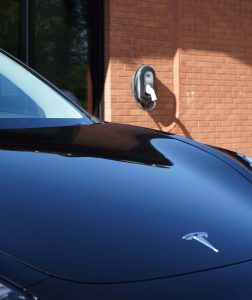 EV Charger with Tesla Outside